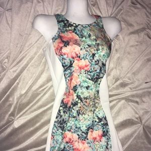 White and floral form-fitting dress